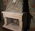 Fireplace in tartar stone and limestone argentoro.